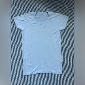 Lululemon Swiftly Tech Short Sleeve shirt in “blue linen” size 8